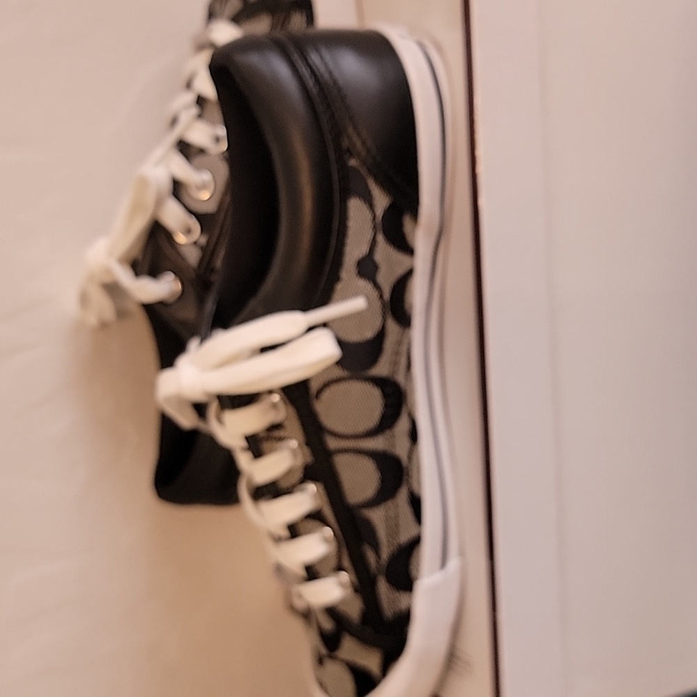 Signature gray and black low top coach sneakers shoes.